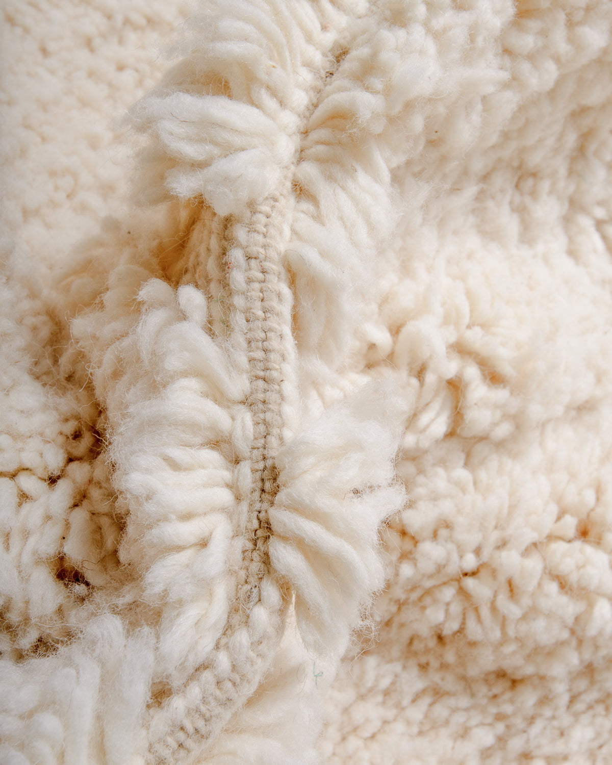 Detail of wool Berber rug showing density of pile.